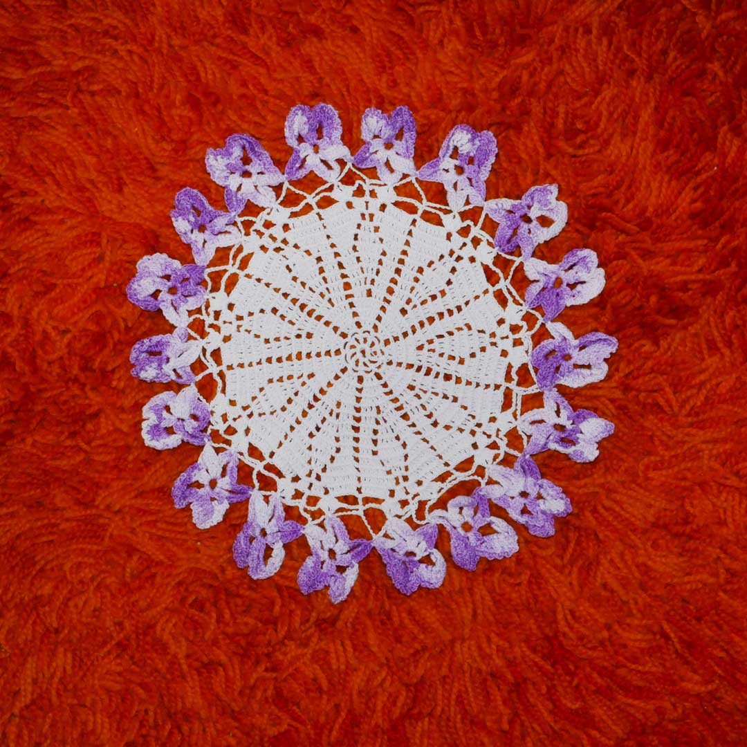 purple floral doily