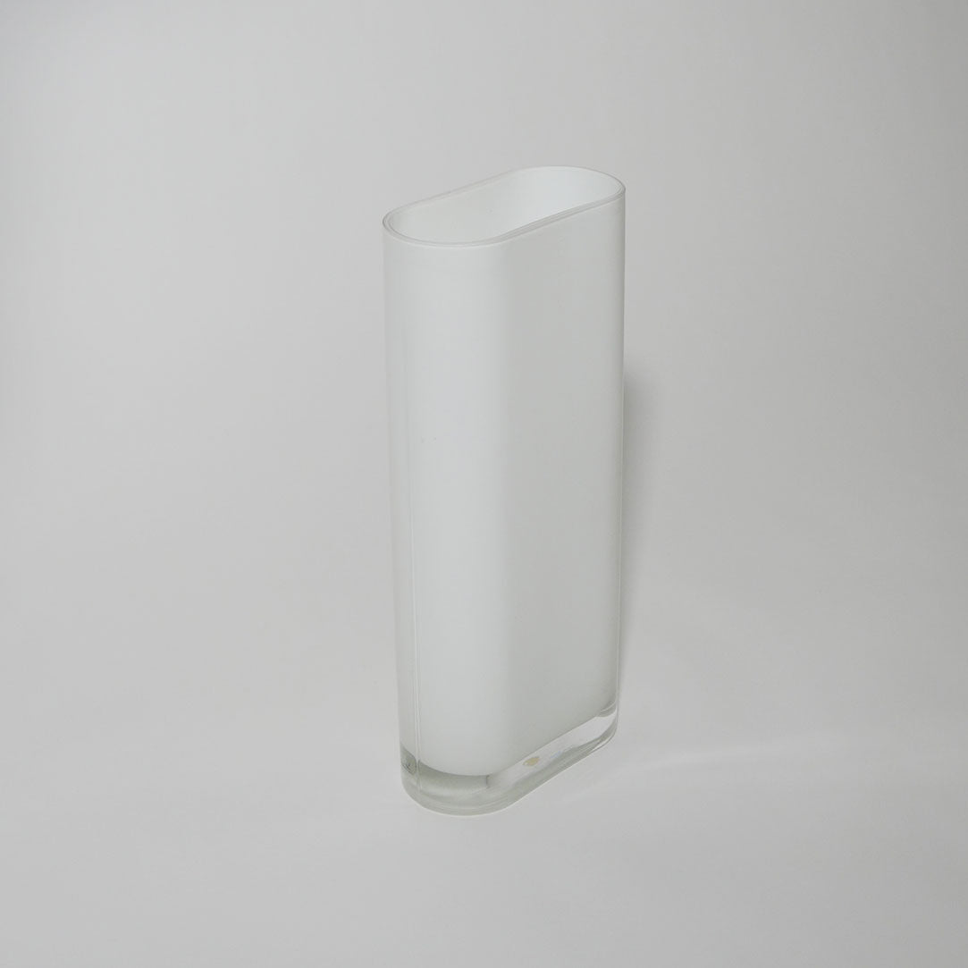 tall white glass vase