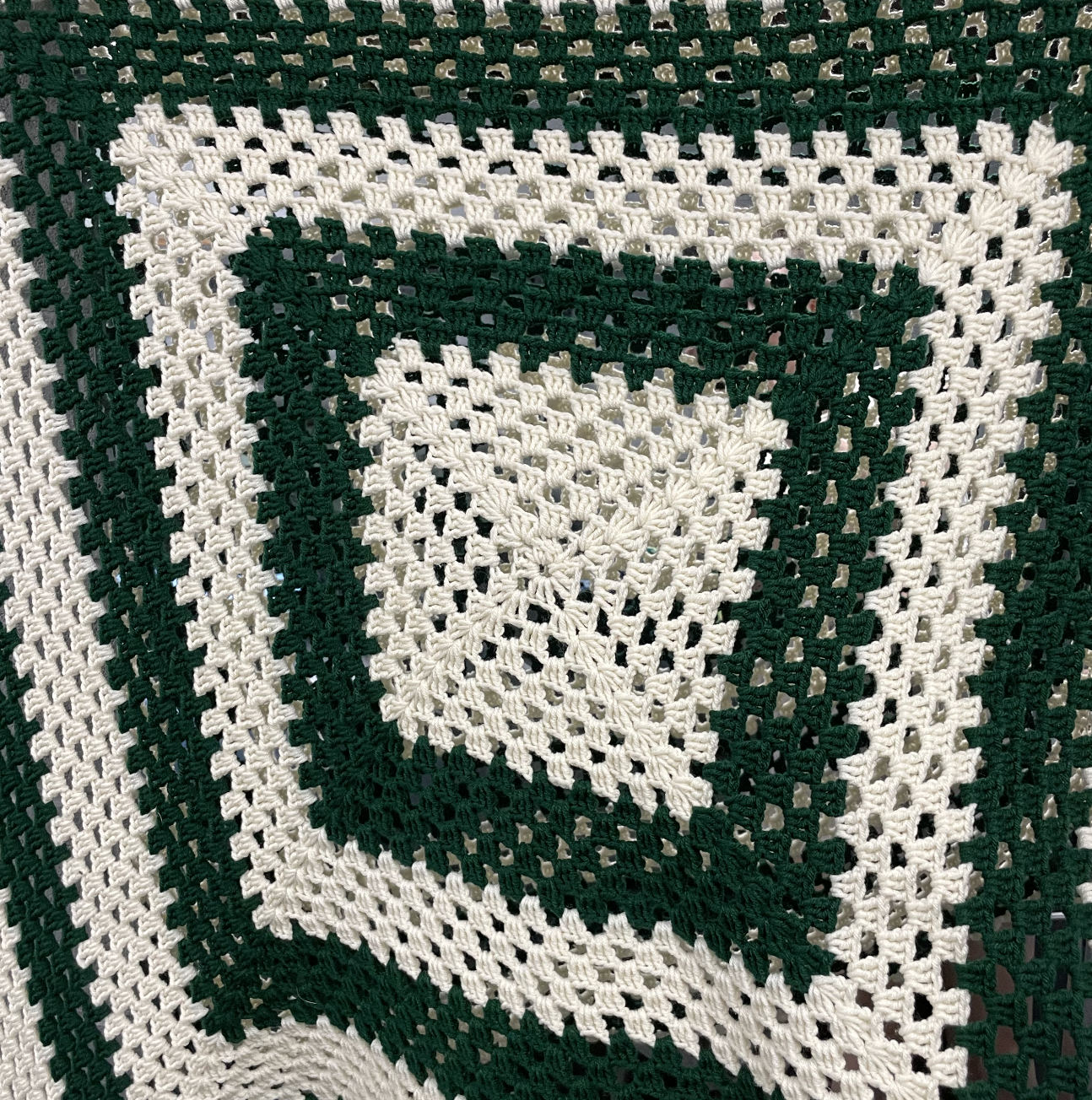 green crochet knit blanket