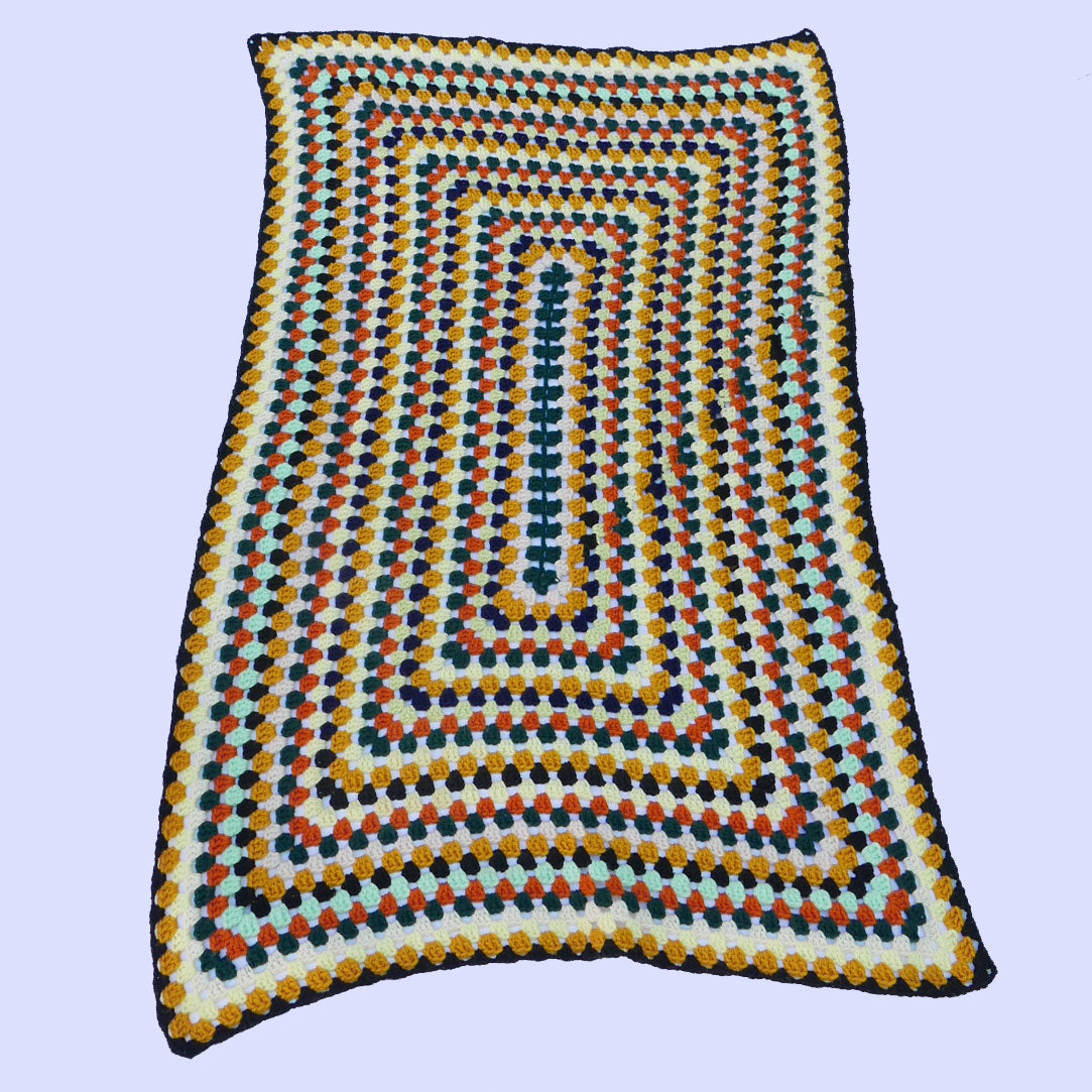 vintage multicolour crochet granny blanket