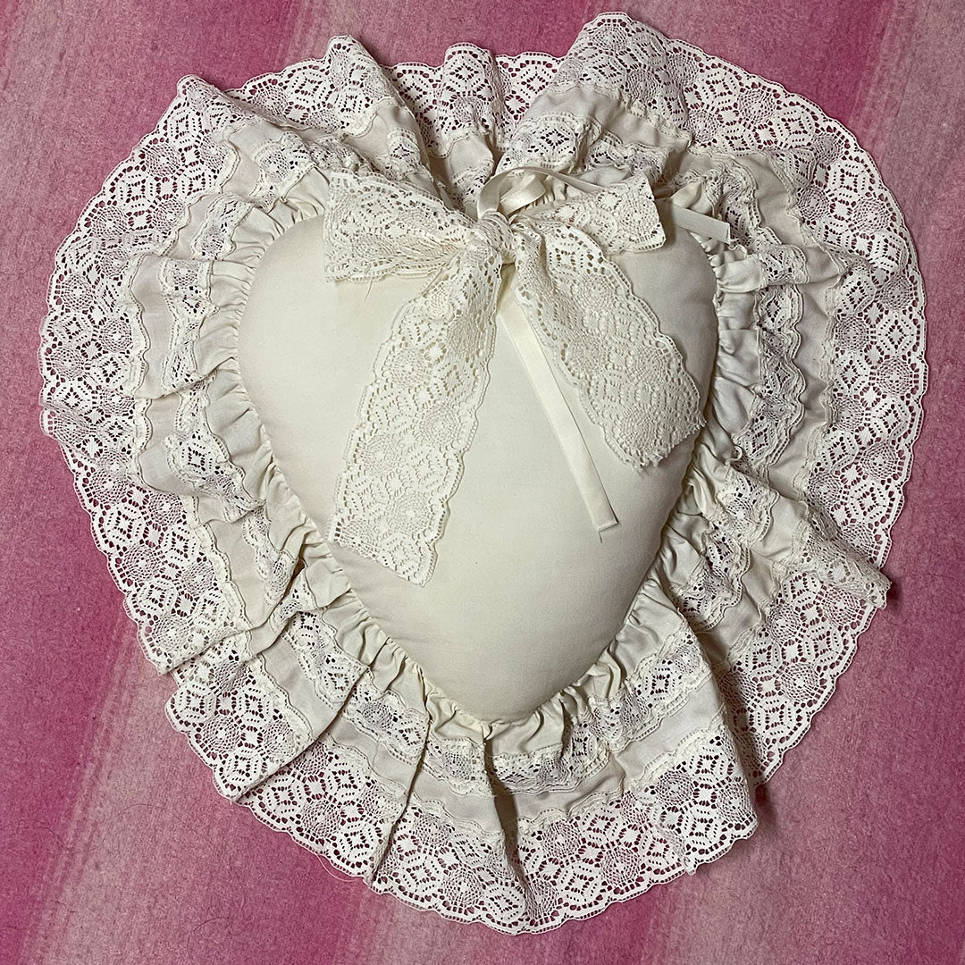 cream heart pillow