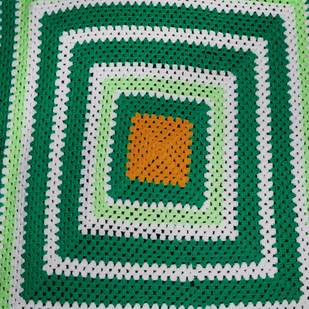green crochet blanket