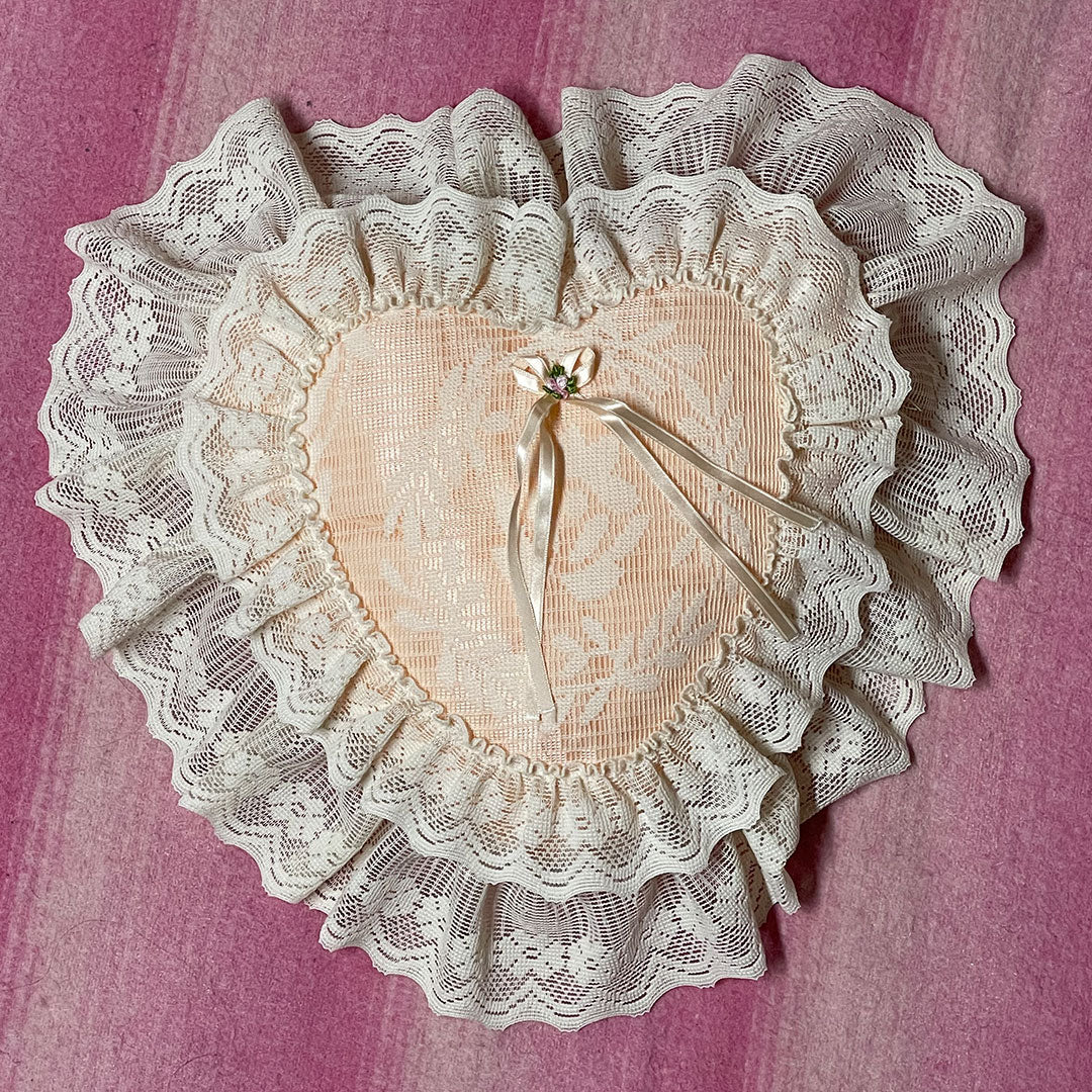 pink heart throw pillow