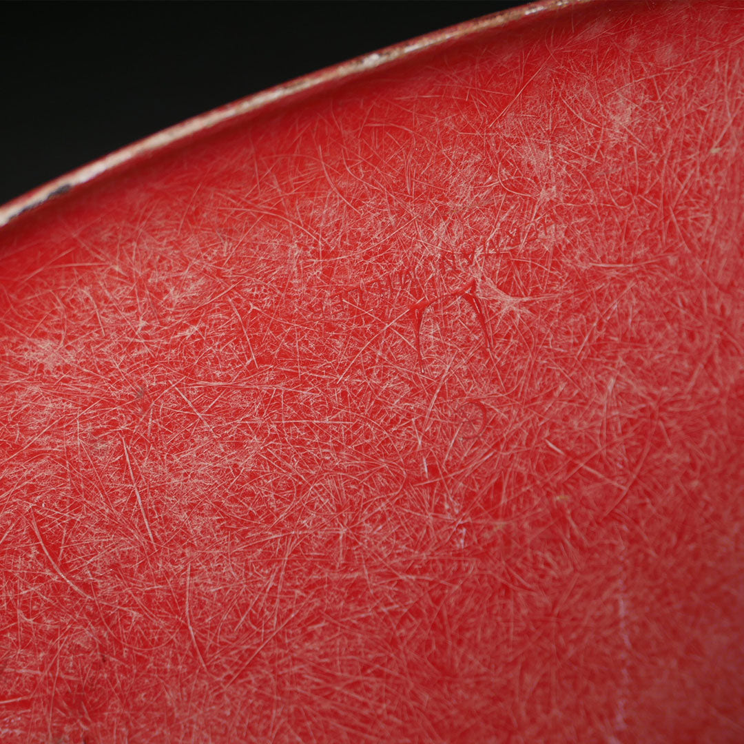 orange herman miller fiberglass shell chair