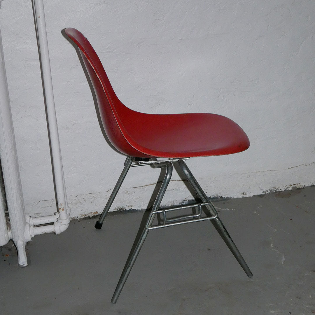orange herman miller fiberglass shell chair