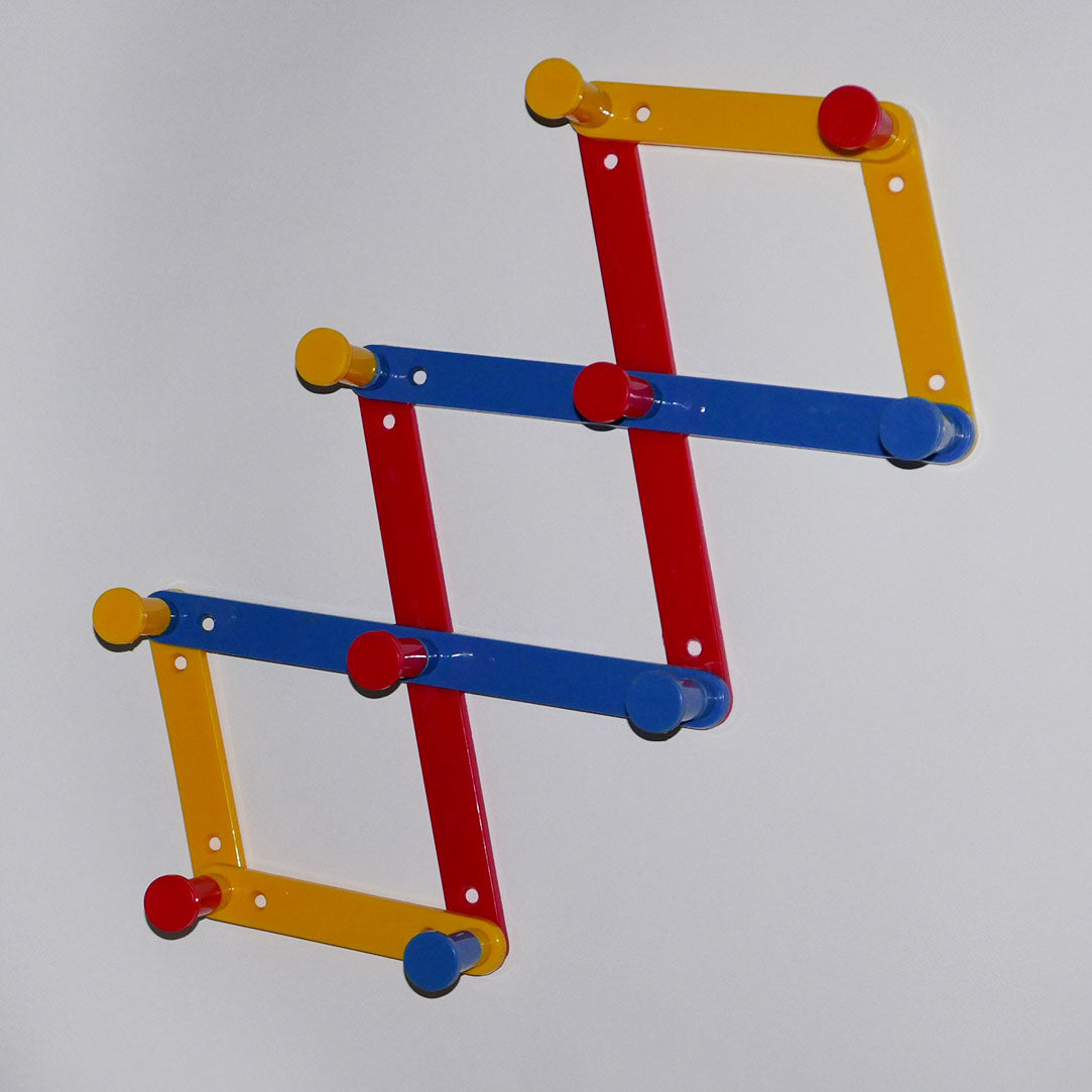 80s plastic expandable wall rack
