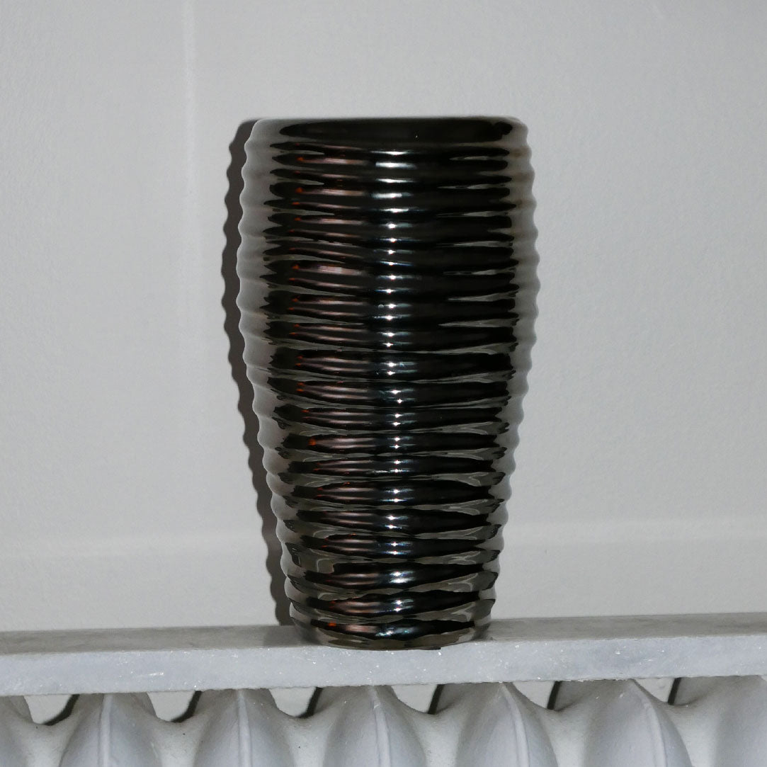 space age bullet vase