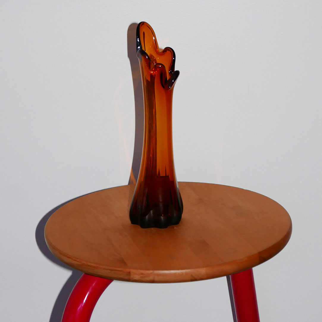 swung glass vase amber