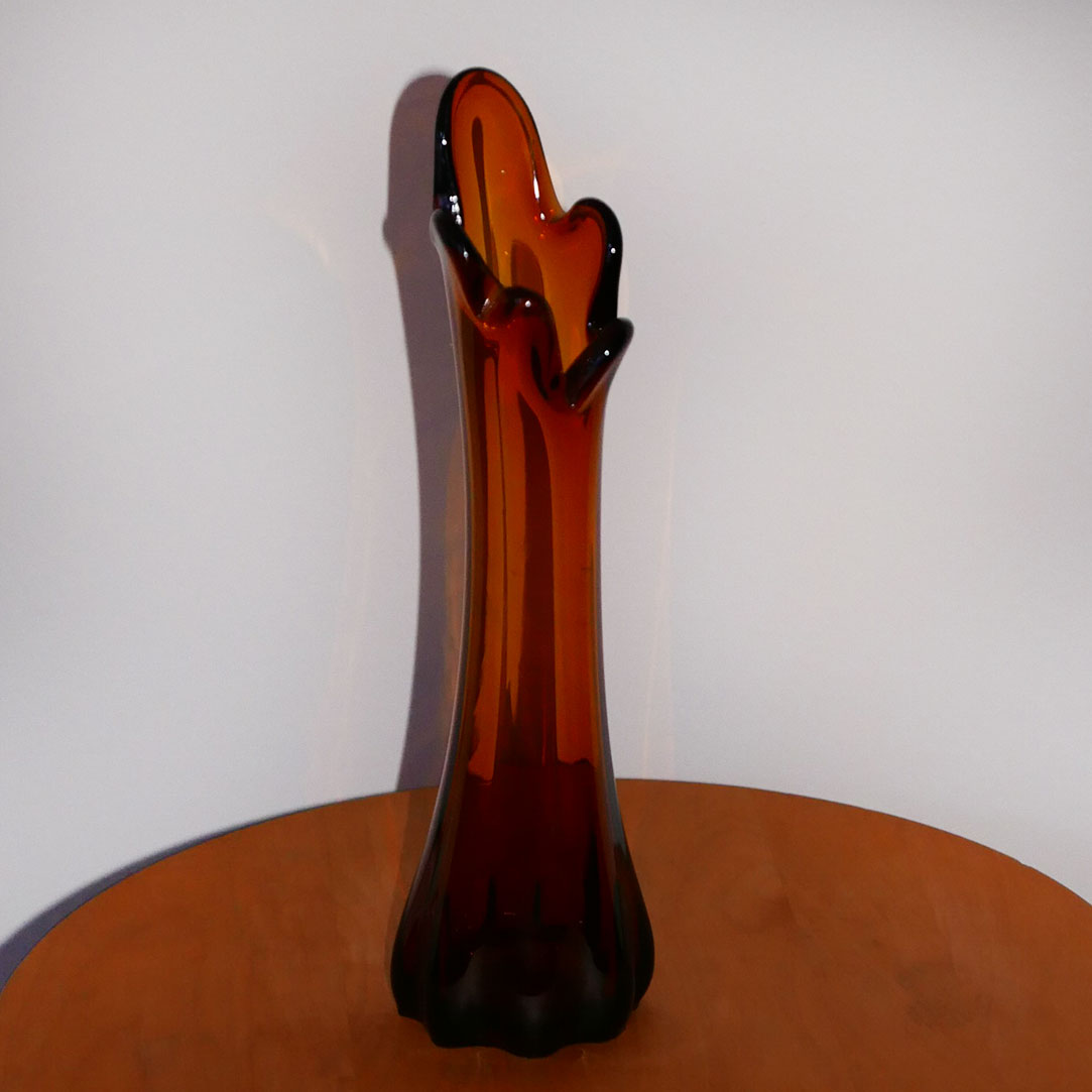 swung glass vase amber
