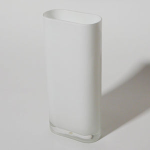 tall white glass vase