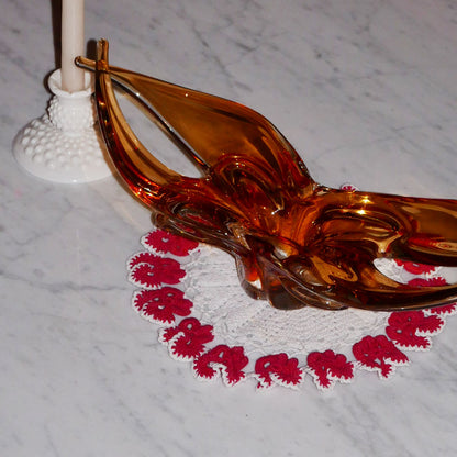 red trim doily