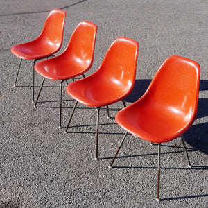 set of 4 stamped eames for herman miller fiberglass shell chairs