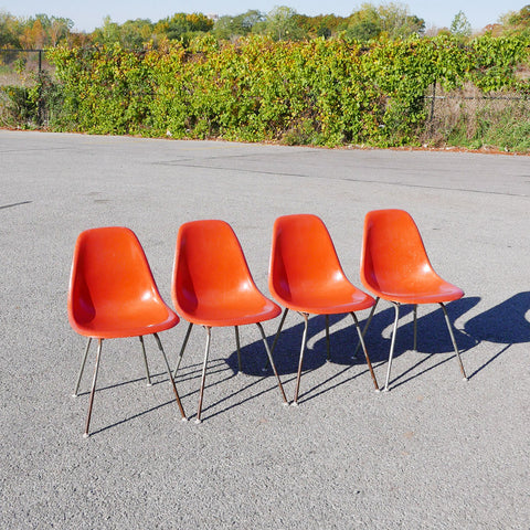 set of 4 stamped eames for herman miller fiberglass shell chairs