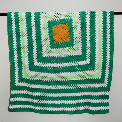 green crochet blanket