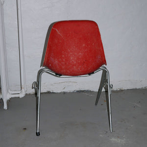 orange herman miller fiberglass shell chair