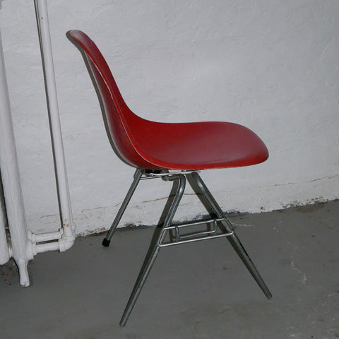 orange herman miller fiberglass shell chair