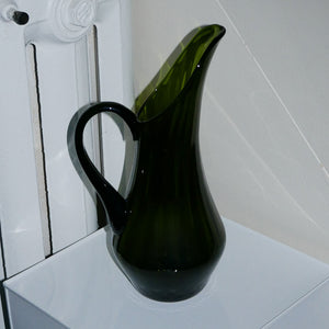 green glass jug