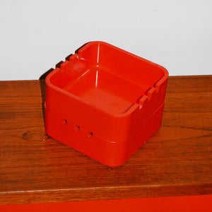 plastic orange ashtray