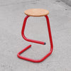 lacquered red tubular metal and maple seat K700 paperclip stool by Hamilton & Salmon for Amisco. a 1969 canadian designed classic.