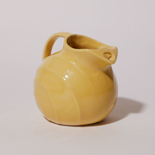 yellow hall's art deco pitcher