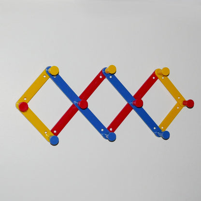 80s plastic expandable wall rack