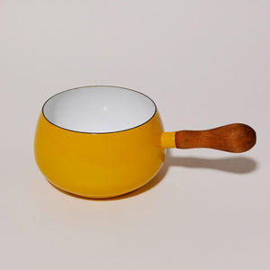 yellow enamel saucepan with wood handle