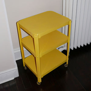 yellow space age utility cart