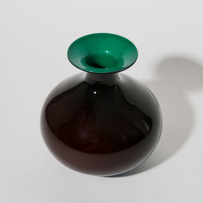 round hand blown black and teal vase