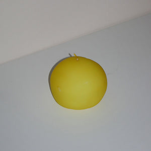 round yellow candle